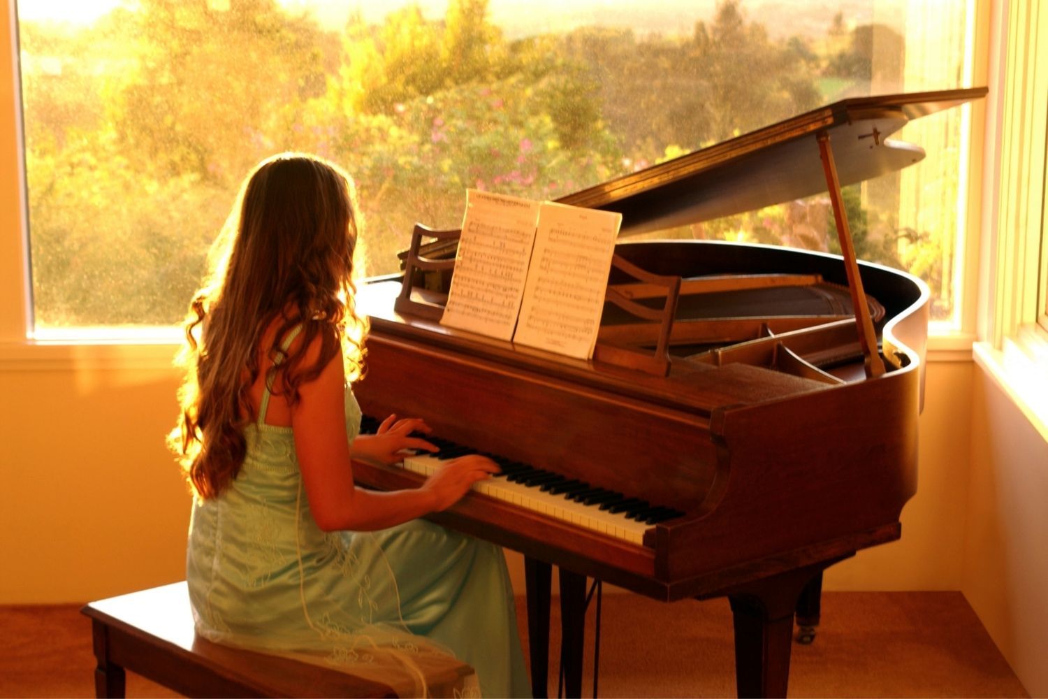 Teen Girl Playing Piano