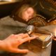 psychic pointing at deck of tarot cards