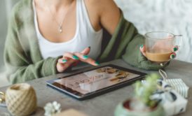 woman making powerpoint in tablet device