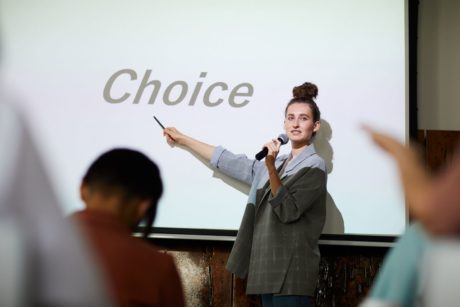 woman making presentation about choice