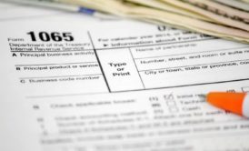 Learn to enter tax data for a partnership into tax Form 1065