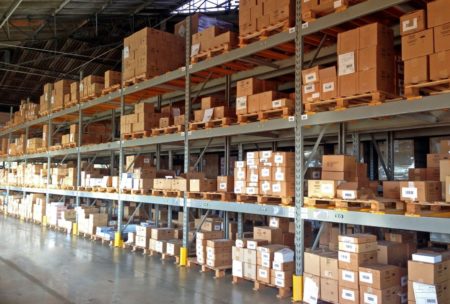 amazon fba canada warehouse showcasing multiple boxes and shelves for storage