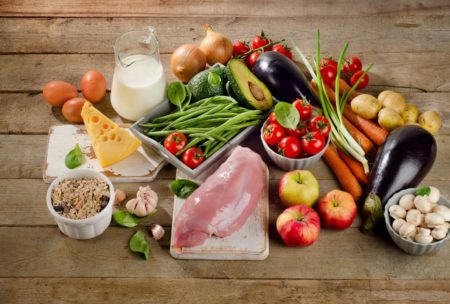 nutrition course for beginners highlighting a balanced diet with protein-rich chicken, fresh vegetables, eggs, and dairy milk