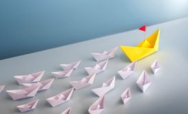 white and yellow paper boats