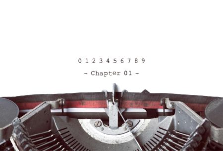 a closeup image of a typewriter typing chapter 01 of Write A Great How To Book Fast