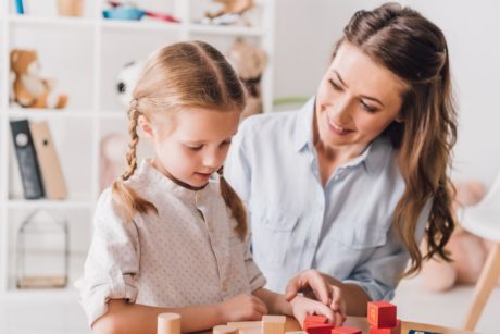 mother and daughter playing