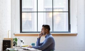 man working on desk