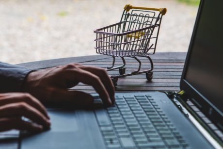 man managing etsy store