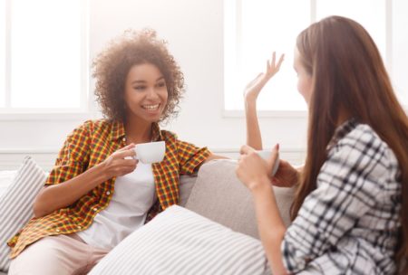 two women talking to each other