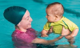 mom baby having swim lessons