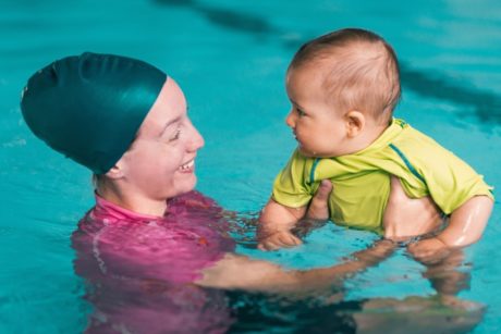 mom baby having swim lessons