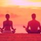 man and woman meditating