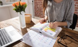 female remote worker planning schedule