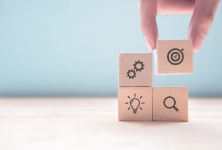 sales icon on wooden blocks