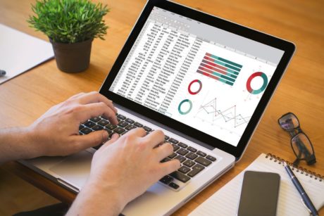 excel model on silver laptop