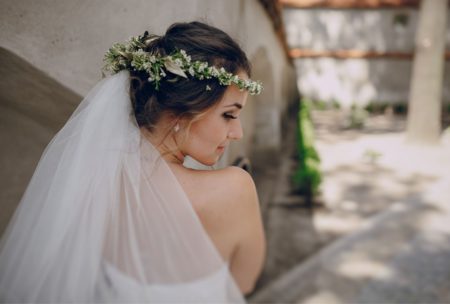 bride wearing flowers in her hair