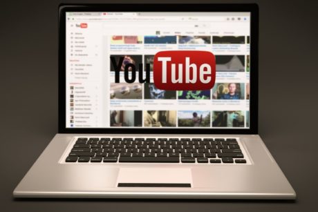 youtube on silver laptop