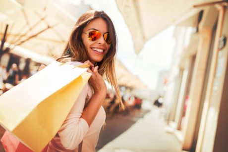 woman carrying shopping bags