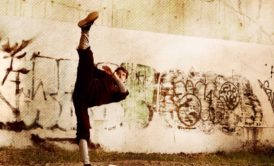 person practicing kicks