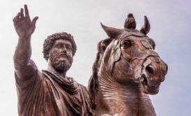 bronze statue of marcus aurelius riding on a horse