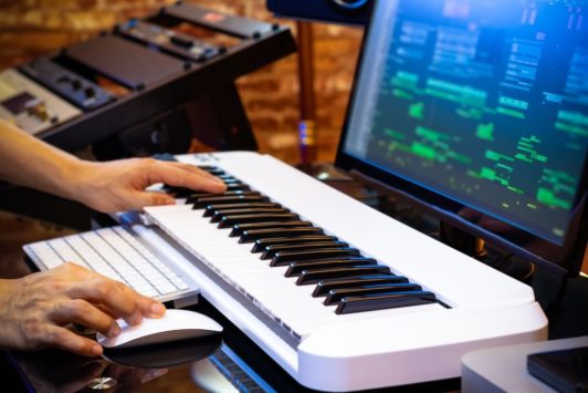 music producer playing the organ