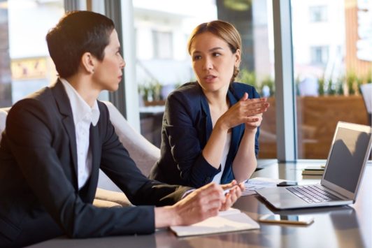 woman talking to man and handling an objection