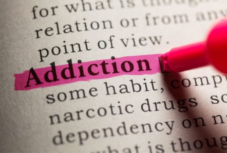 addiction highlighted in dictionary