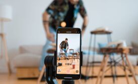 Self-recording man on phone for TikTok Marketing Essentials