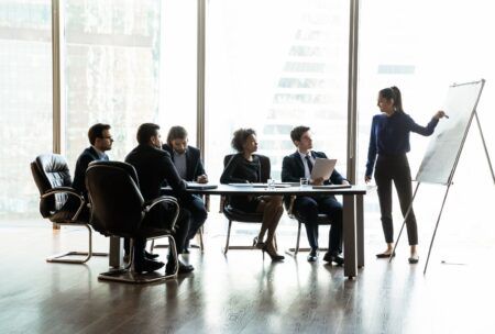 Confident young woman engaging in public speaking and presentation