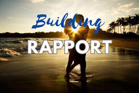 Two people on a beach with a text overlay that reads Building Rapport