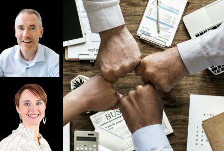 hands in unity of a diverse group of individuals, symbolizing collaboration and conflict management skills