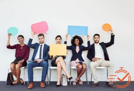 Business professionals sitting on chairs with speech bubbles, discussing how to improve employee engagement.