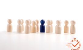 A blue figure stands confidently among a group of white individuals, showcasing unique influencing skills and presence.