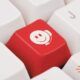 A red smiley face button on a white keyboard, highlighting a lighthearted touch in dealing with difficult customers training