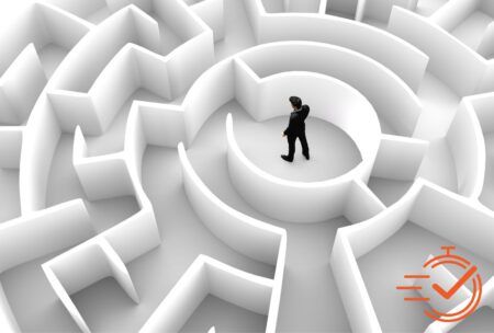 A man confidently stands in a maze, symbolizing successful problem solving course